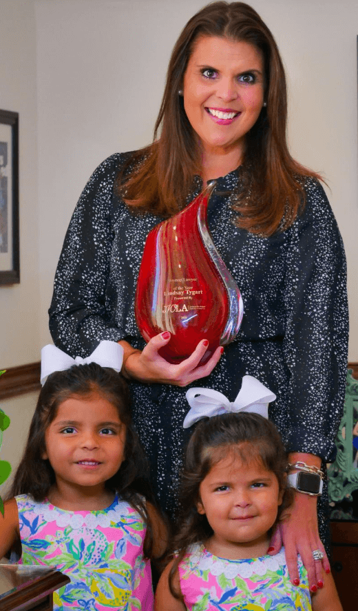 2020 Woman of the Year Lindsay Tygart with her daughters. 