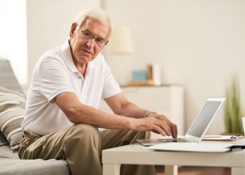 Senior Man Working at Home